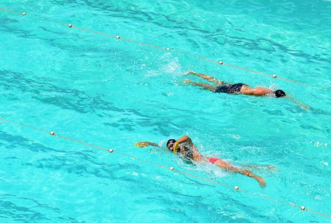 Adult swimming freestyle in the pool